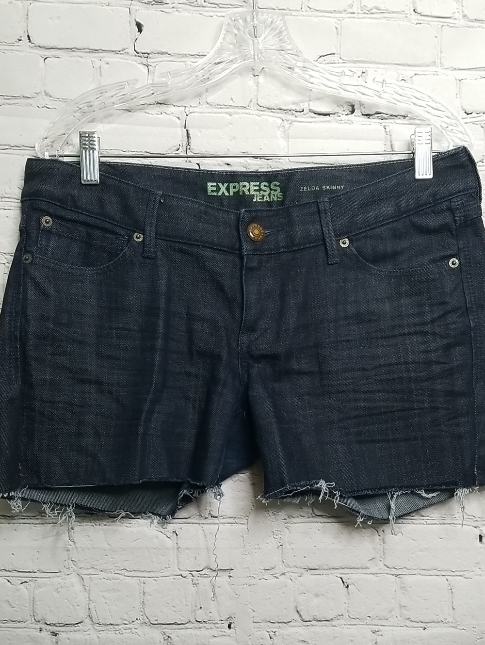 Express womens jeans shorts size 10 raw hem distressed EUC